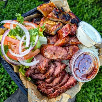 Tritip, hmong sausage, chicken, salad and sticky rice